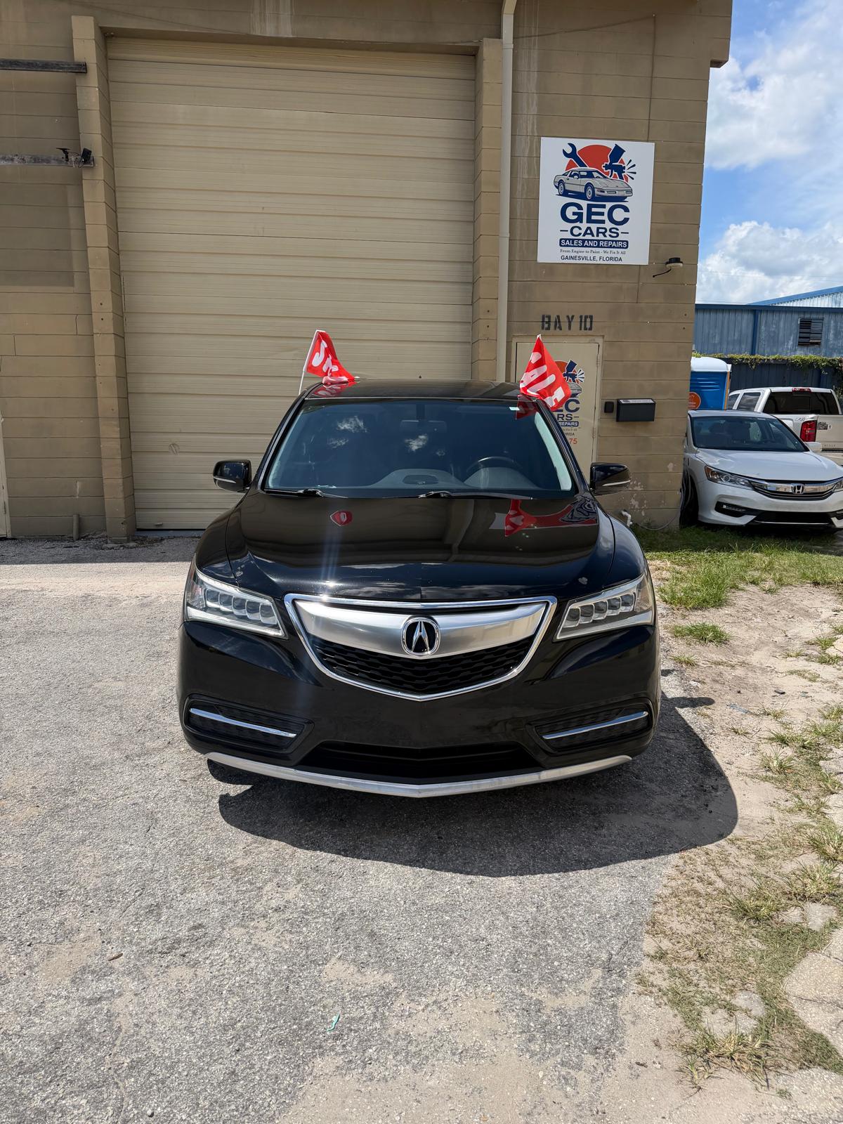 2014 Acura MDX 3.5L front view at G.E.C Cars in Gainesville